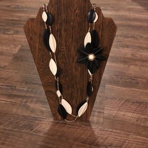 Black and white necklace with brown beads